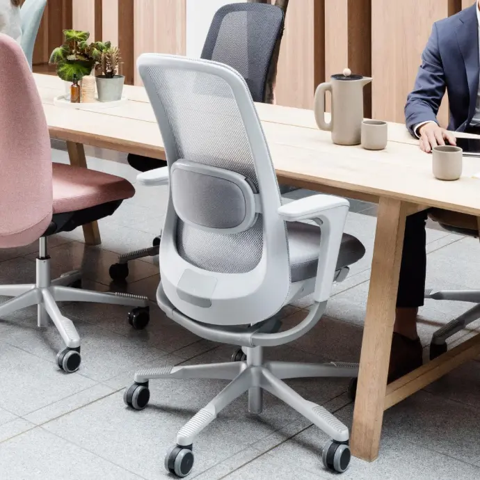 Check out ergonomic office chairs like the HÅG SoFi Mesh 7500 HÅG SoFi Mesh 7500 ergonomic office chair in grey at a desk